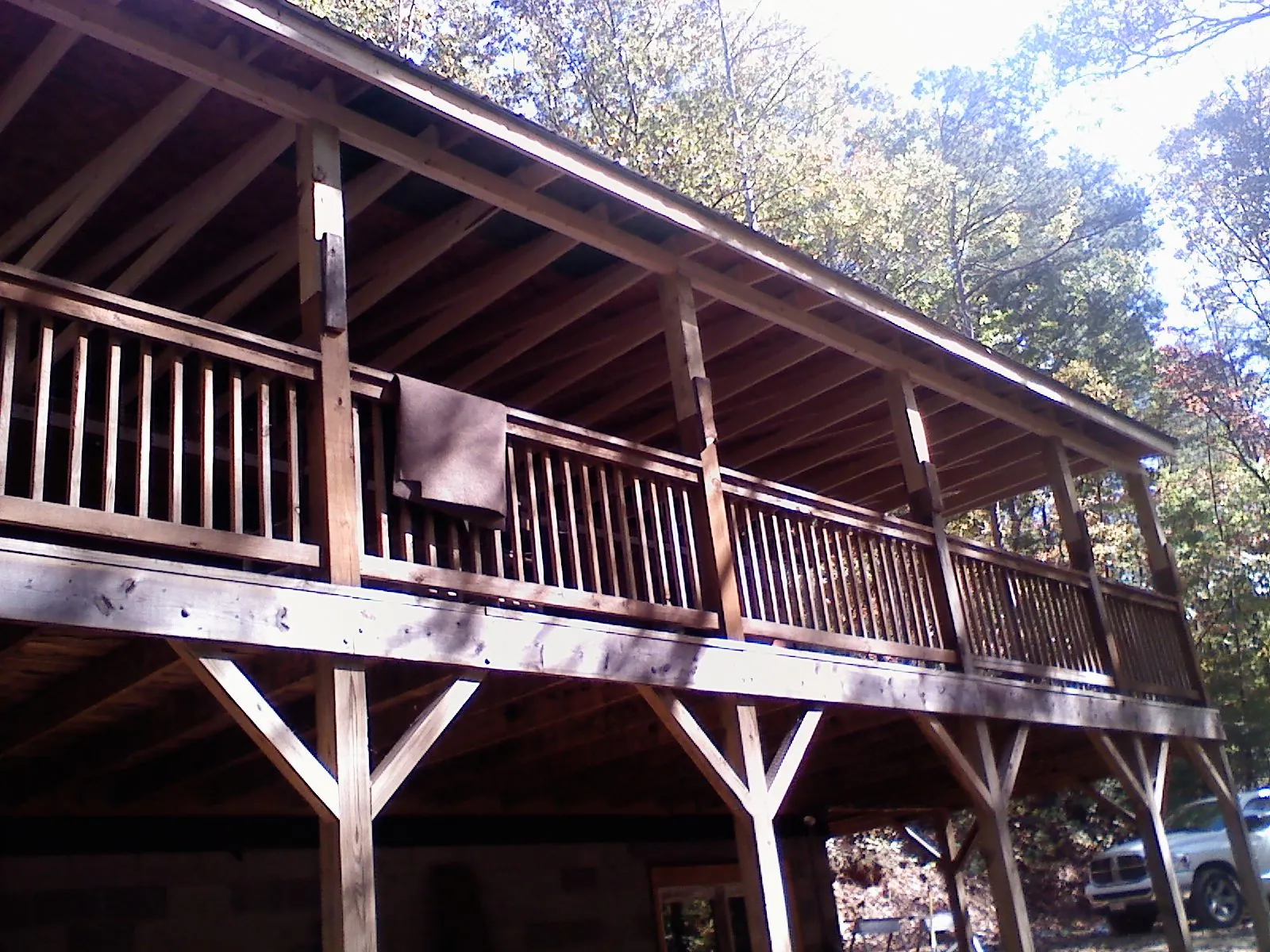 Timber framing under a new elevated porch and deck — Roof Leak Repair in Woodsboro by Roofing Brothers